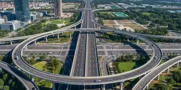 Infrastructure Bill Update: $500 Billion Federal Funding Allocated Through 2026 Modern highway interchange with multiple bridges and overpasses, symbolizing infrastructure investment